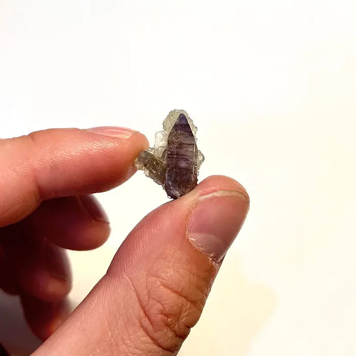 14ct Special Tanzanite & Prehnite Crystal 14ct Special Tanzanite & Prehnite Crystal. Natural tanzanite crystal from Merelani Hills, photo 2 of 5