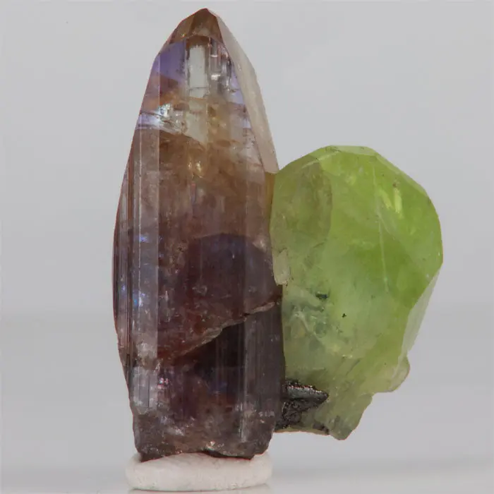 Unheated Tanzanite Crystal with Green Diopside: 4.96g Unheated Tanzanite Crystal with Green Diopside: 4.96g. Natural tanzanite crystal from Tanzania, photo 5 of 5