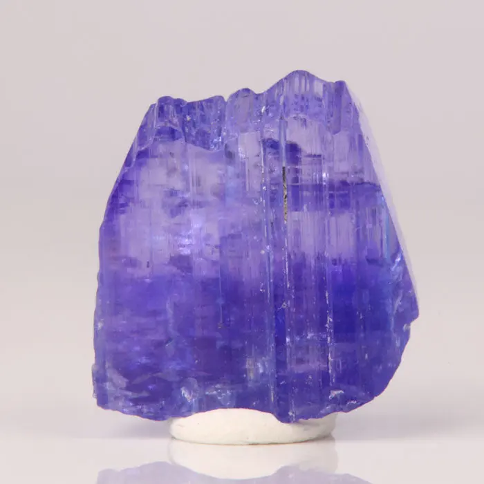 18ct Raw Tanzanite Crystal 18ct Raw Tanzanite Crystal. Natural tanzanite crystal from Merelani Hills, Tanzania, photo 1 of 4
