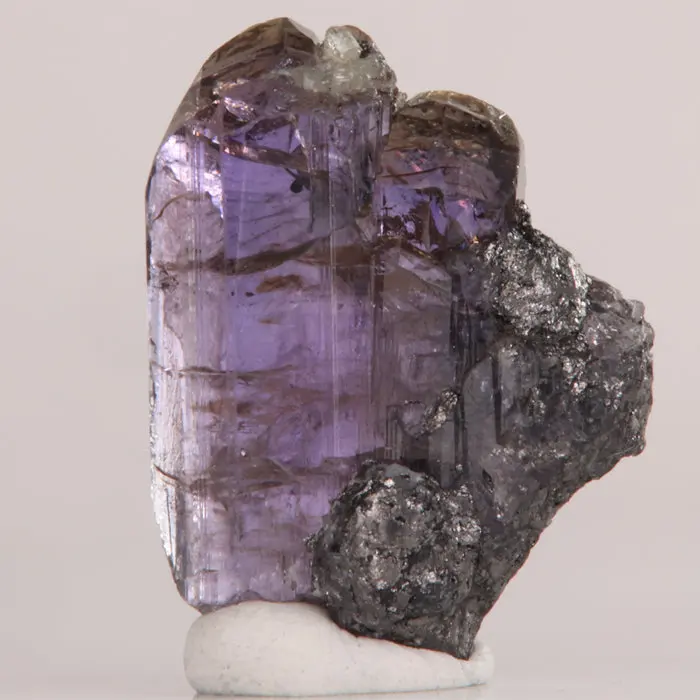 16.60ct Unheated Tanzanite Crystal on Graphite 16.60ct Unheated Tanzanite Crystal on Graphite. Natural tanzanite crystal from Merelani Hills, Tanzania, photo 1 of 4