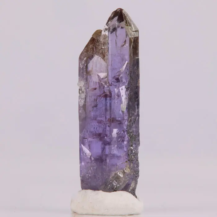 12.5ct Tall Thin Tanzanite Crystal 12.5ct Tall Thin Tanzanite Crystal. Natural tanzanite crystal from Merelani Hills, Tanzania, photo 1 of 5