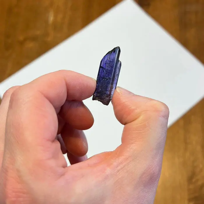 44.9ct Interesting Deep Color Tanzanite Crystal 44.9ct Interesting Deep Color Tanzanite Crystal. Natural tanzanite crystal from Merelani Hills, photo 2 of 4