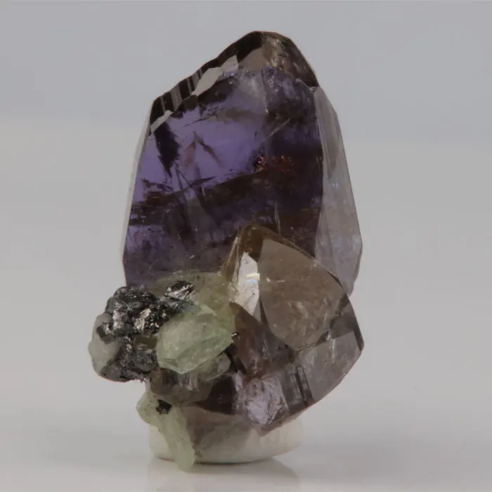 13.12ct Natural Tanzanite and Diopside Crystal 13.12ct Natural Tanzanite and Diopside Crystal. Natural tanzanite crystal from Merelani Hills, Tanzania, photo 1 of 4