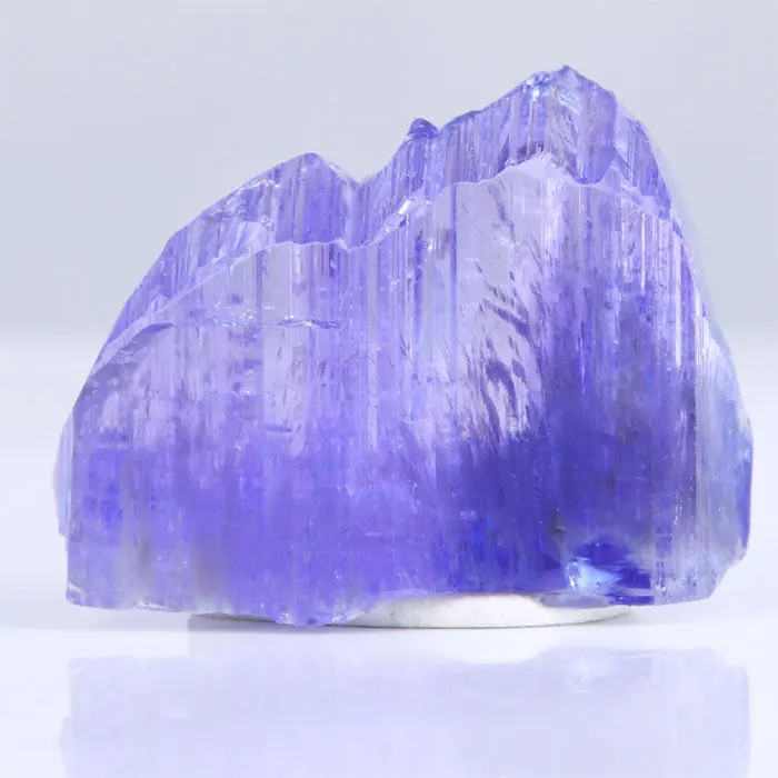 50.31ct Lavender Tanzanite Crystal with Wispy Inclusion 50.31ct Lavender Tanzanite Crystal with Wispy Inclusion. Natural tanzanite crystal from Merelani Hills, photo 1 of 6