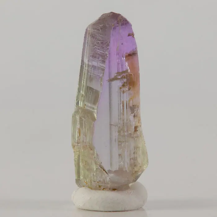Pinkish Violet and Yellow Gemmy Tanzanite Crystal: 12.64ct Pinkish Violet and Yellow Gemmy Tanzanite Crystal: 12.64ct. Natural tanzanite crystal from Mererani, Tanzania, photo 1 of 5