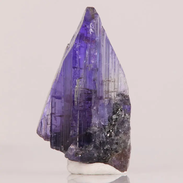 27.7ct Raw Natural Color Tanzanite Crystal 27.7ct Raw Natural Color Tanzanite Crystal. Natural tanzanite crystal from Merelani Hills, Tanzania, photo 1 of 4