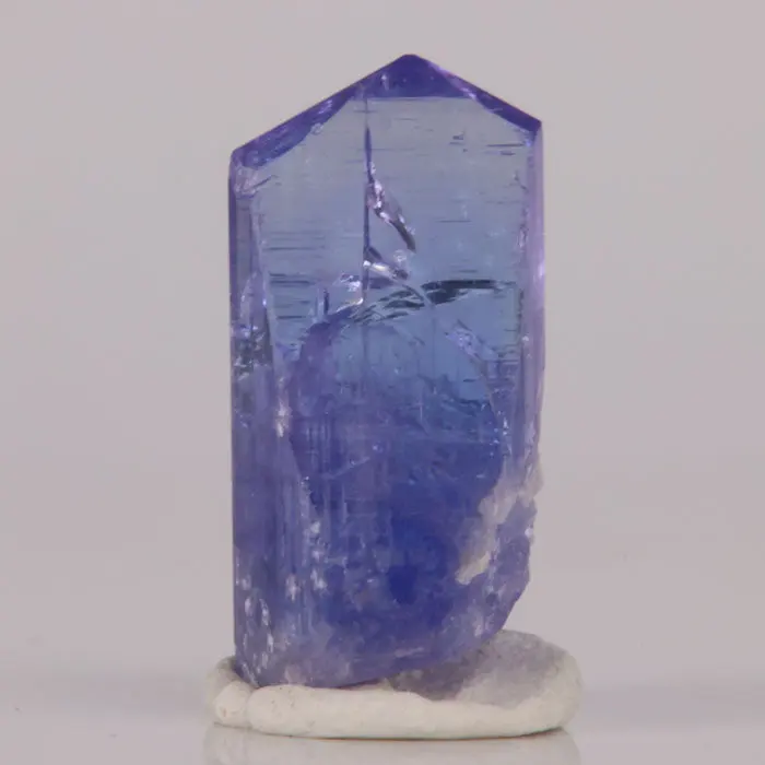 12.34ct Pretty Color Tanzanite Crystal 12.34ct Pretty Color Tanzanite Crystal. Natural tanzanite crystal from Merelani Hills, Tanzania, photo 1 of 4