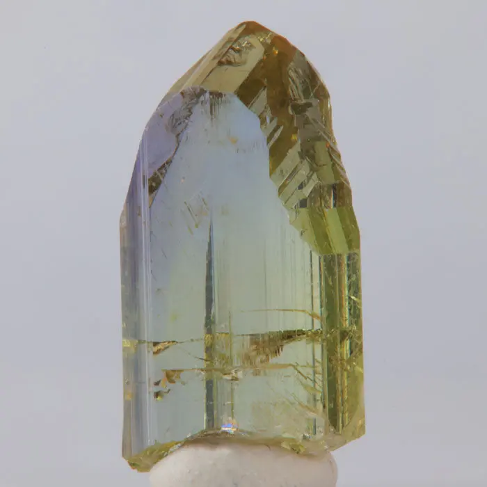 18.28ct Stunning Yellow & Purple Glassy Tanzanite Crystal 18.28ct Stunning Yellow & Purple Glassy Tanzanite Crystal. Natural tanzanite crystal from Merelani Hills, photo 1 of 7