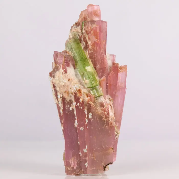 257ct Pink Tanzanite Crystal & Tremolite Mineral Crystal 257ct Pink Tanzanite Crystal & Tremolite Mineral Crystal. Natural tanzanite crystal from Merelani Hills, photo 1 of 5