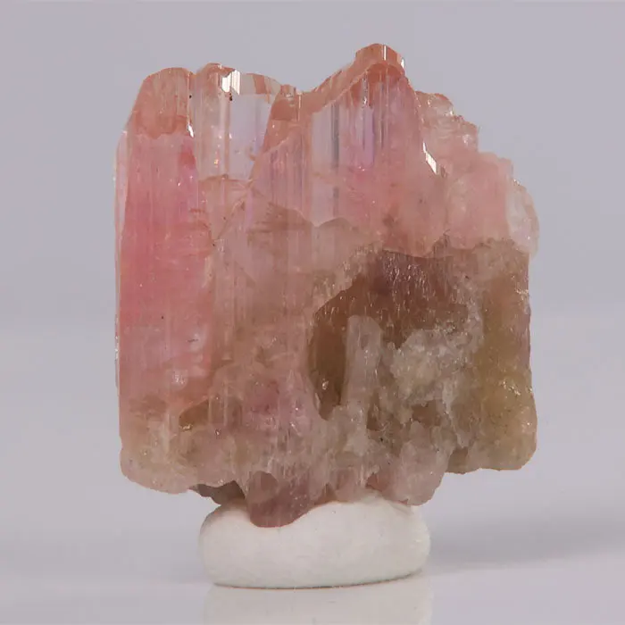 14.7ct Peachy Pink Tanzanite Crystal 14.7ct Peachy Pink Tanzanite Crystal. Natural tanzanite crystal from Merelani Hills, Tanzania, photo 1 of 4