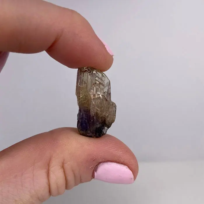 14.9ct Fancy Peachy Pink Tanzanite Crystal 14.9ct Fancy Peachy Pink Tanzanite Crystal. Natural tanzanite crystal from Merelani Hills, Tanzania, photo 2 of 4