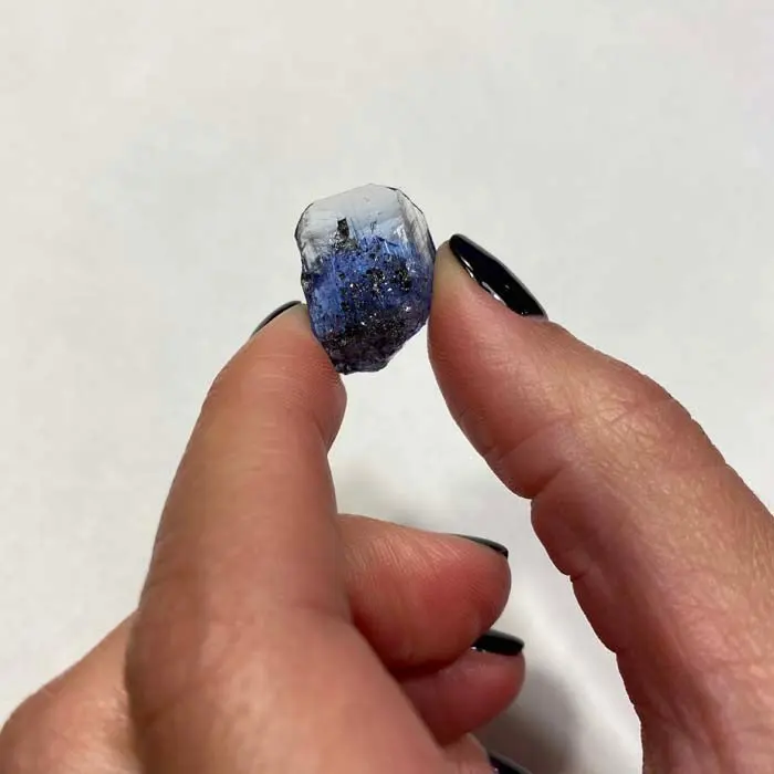 19.70ct Raw Tanzanite Crystal 19.70ct Raw Tanzanite Crystal. Natural tanzanite crystal from Merelani Hills, photo 2 of 4