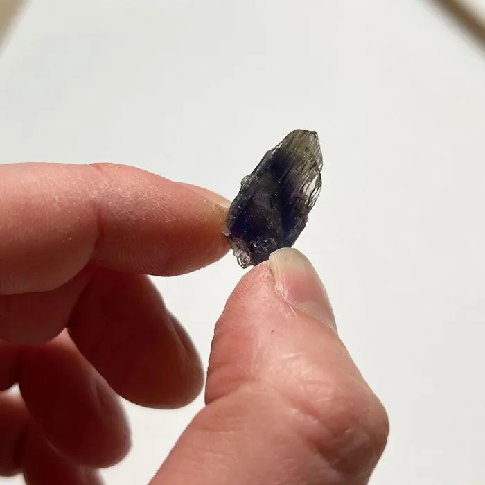 12.8ct Color Zoned Natural Tanzanite Crystal 12.8ct Color Zoned Natural Tanzanite Crystal. Natural tanzanite crystal from Merelani Hills, Tanzania, photo 2 of 3