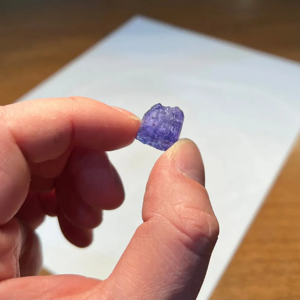 18ct Raw Tanzanite Crystal 18ct Raw Tanzanite Crystal. Natural tanzanite crystal from Merelani Hills, Tanzania, photo 2 of 4