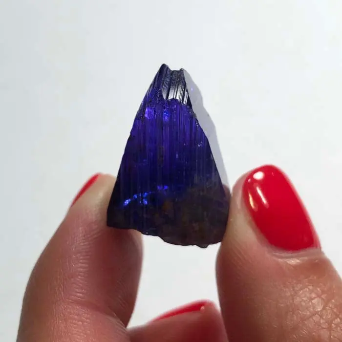 40.90ct Blue/Violet Tanzanite Crystal 40.90ct Blue/Violet Tanzanite Crystal. Natural tanzanite crystal from Merelani Hills, Tanzania, photo 2 of 6