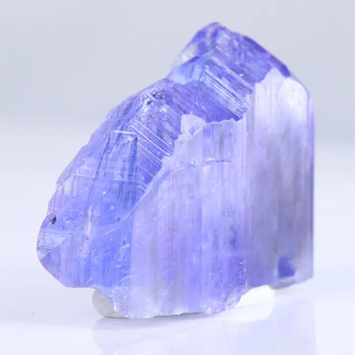 50.31ct Lavender Tanzanite Crystal with Wispy Inclusion 50.31ct Lavender Tanzanite Crystal with Wispy Inclusion. Natural tanzanite crystal from Merelani Hills, photo 6 of 6