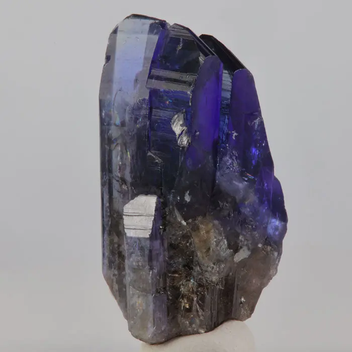 105ct Deep Natural Color Tanzanite Crystal Cluster 105ct Deep Natural Color Tanzanite Crystal Cluster. Natural tanzanite crystal from Merelani Hills, Tanzania, photo 4 of 5