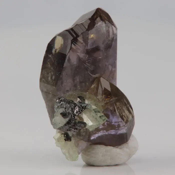 13.12ct Natural Tanzanite and Diopside Crystal 13.12ct Natural Tanzanite and Diopside Crystal. Natural tanzanite crystal from Merelani Hills, Tanzania, photo 3 of 4