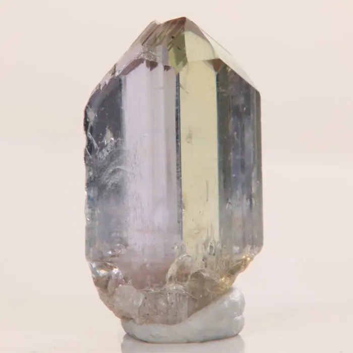14.92ct Light Yellow & Purple Gem Tanzanite Crystal 14.92ct Light Yellow & Purple Gem Tanzanite Crystal. Natural tanzanite crystal from Merelani Hills, photo 4 of 5