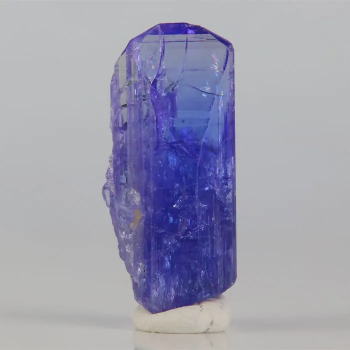 12.8ct Vivid Color Tanzanite Crystal 12.8ct Vivid Color Tanzanite Crystal. Natural tanzanite crystal from Merelani Hills, Tanzania, photo 1 of 3