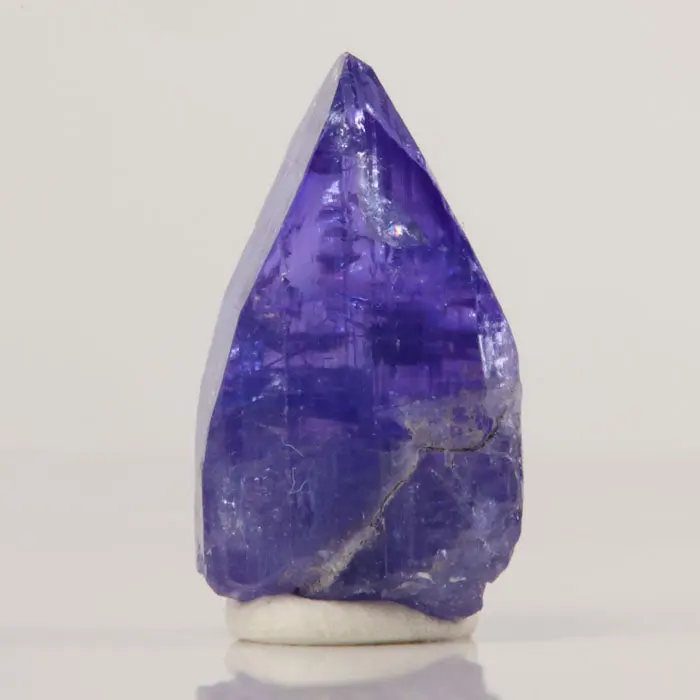21.6ct Deep Blue Violet Tanzanite Crystal 21.6ct Deep Blue Violet Tanzanite Crystal. Natural tanzanite crystal from Merelani Hills, Tanzania, photo 1 of 4