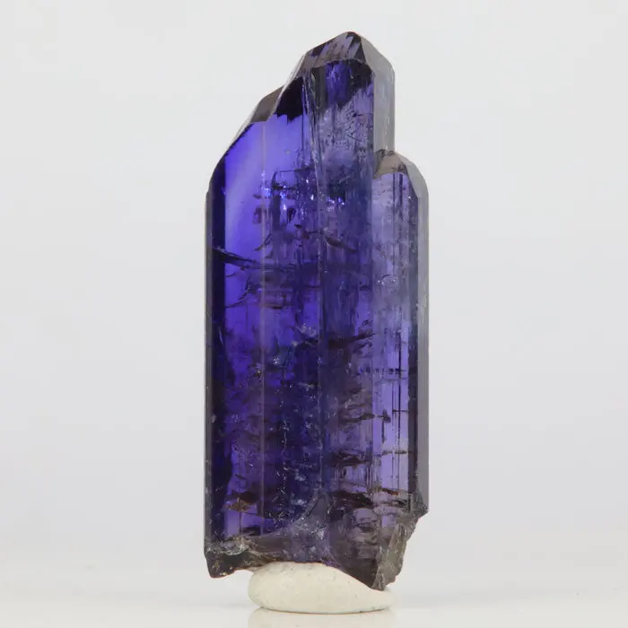 44.9ct Interesting Deep Color Tanzanite Crystal 44.9ct Interesting Deep Color Tanzanite Crystal. Natural tanzanite crystal from Merelani Hills, photo 1 of 4