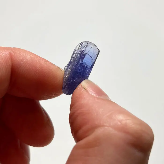 12.8ct Vivid Color Tanzanite Crystal 12.8ct Vivid Color Tanzanite Crystal. Natural tanzanite crystal from Merelani Hills, Tanzania, photo 2 of 3