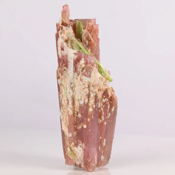 257ct Pink Tanzanite Crystal & Tremolite Mineral Crystal 257ct Pink Tanzanite Crystal & Tremolite Mineral Crystal. Natural tanzanite crystal from Merelani Hills, photo 5 of 5