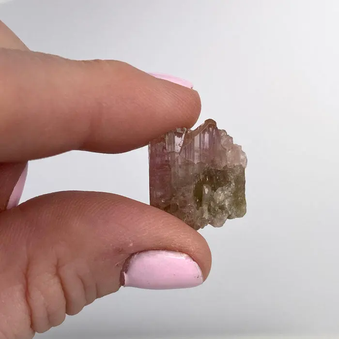 14.7ct Peachy Pink Tanzanite Crystal 14.7ct Peachy Pink Tanzanite Crystal. Natural tanzanite crystal from Merelani Hills, Tanzania, photo 2 of 4
