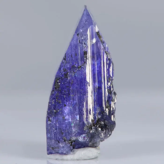 19.70ct Raw Tanzanite Crystal 19.70ct Raw Tanzanite Crystal. Natural tanzanite crystal from Merelani Hills, photo 3 of 4