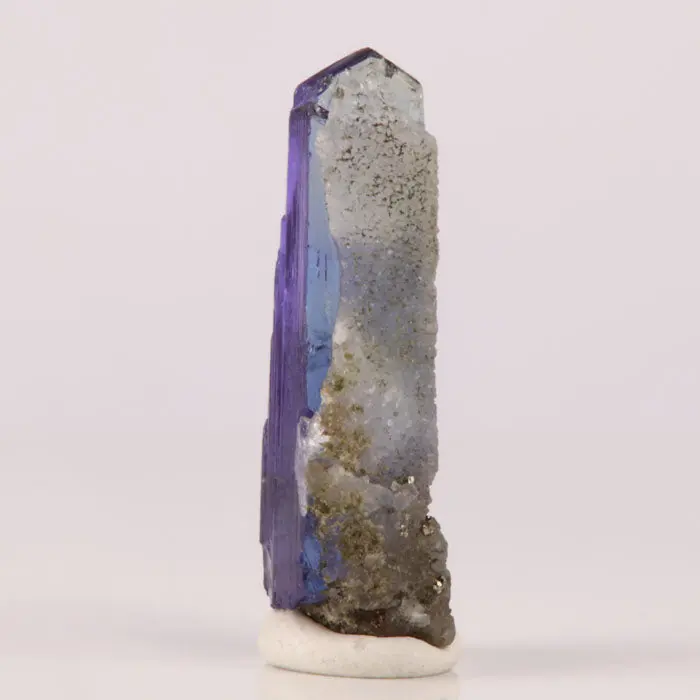 10.59ct Tanzanite crystal with Calcite 10.59ct Tanzanite crystal with Calcite. Natural tanzanite crystal from Merelani Hills, Tanzania, photo 4 of 4